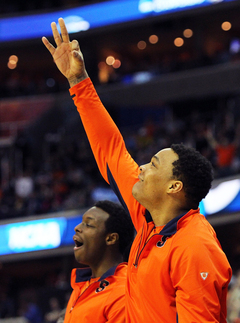 DaJuan Coleman #32 of the Syracuse Orange celebrates as he signals a three point play late in the game against the Marquette Golden Eagles.