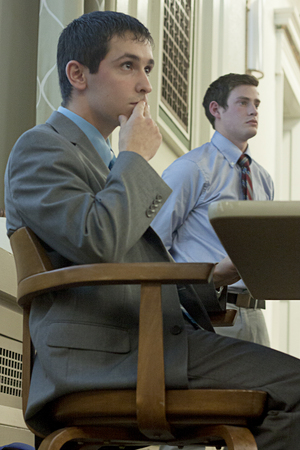 Stephen Desalvo and Dylan Lustig, Student Association comptroller and president, respectively, look on during SA’s meeting to allocate funding to student organizations.