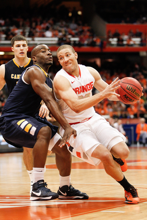 Syracuse guard Brandon Triche drives to the basket in the Orange's 85-61 win over Canisius in the Carrier Dome on Saturday. Triche had a game-high 19 points in his 35 minutes on the floor. 