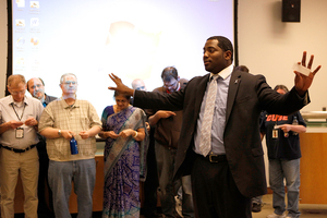 Raheem Mack, men’s outreach program assistant coordinator at Vera House, gives a presentation Wednesday afternoon at Bird Library as part of The White Ribbon Campaign, a male-led, month-long effort to raise awareness about domestic, sexual and relationship abuse. 