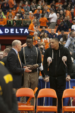 Jerami Grant (left) stands next to DaJuan Coleman (right) prior to Syracuse's 67-62 loss to Georgia Tech on Tuesday. Grant didn't dress or play in the game. 