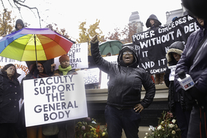 Syracuse University faculty members show their support as students in THE General Body protest against SU's administration near the Remembrance Wall in front of Hall of Languages in November 2014.