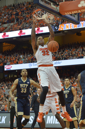 Syracuse forward Dajuan Coleman slams a dunk down. He scored eight points and grabbed eight rebounds for the Orange. 