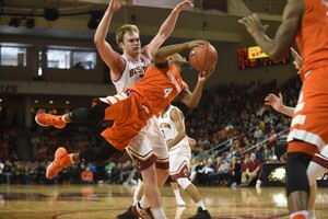 Point guard John Gillon tries to get through the lane. He, and SU, came up short on Sunday. 