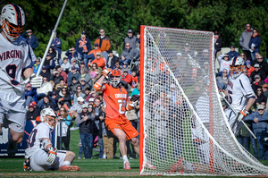 Tucker Dordevic celebrates one of his four goals. His fourth won the game for Syracuse with less than 20 seconds left. 