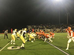 West Genesee's defense (left) got one final stop in the fourth quarter to send the Wildcats to the Class AA sectional final.