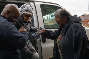 Curtis Martin (left), a deacon at the Tucker Missionary Baptist Church, volunteered as a driver. He drove from New York City to Syracuse early Tuesday morning to participate in the NAACP’s event.