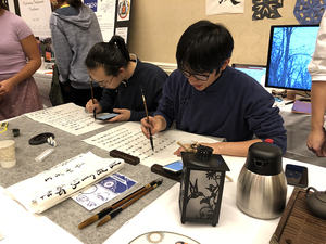 Siqi Tang (left) and Wenyu Chen (right) participate in Syracuse University's first International Fest.