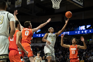 Jimmy Boeheim led Syracuse with 21 points in its 3-point overtime loss.