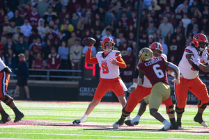 Kyle McCord drops back for one of his 48 attempts against the Eagles.