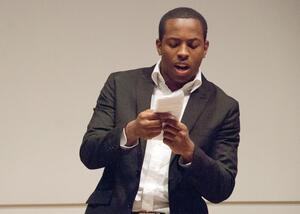 Ousman Diallo, senior information management and technology major, read his poem, Letter to Trayvon, at a Trayvon Martin tribute hosted by the Nu Rho Poetic Society on Tuesday night in the Watson Theater. The event paid tibute to Martin through poetry and discussion.  