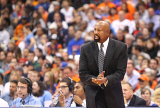 Head coach Mike Woodson of the New York Knicks gestures toward the court during the preseason game against the Philadelphia 76ers.