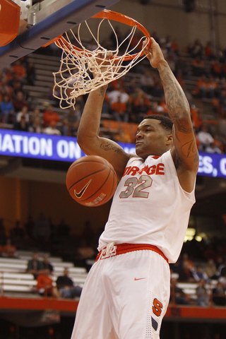 Freshman forward DaJuan Coleman slams home a dunk in SU's win over Bloomsburg.