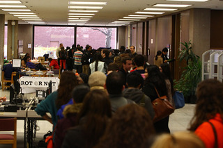 The line of voters in Bird Library stretches across the first floor.