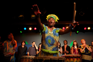 Biboti Ouikahilo encourages all members of the audience to join him and the other 13 other performers on stage to celebrate music and dance. 