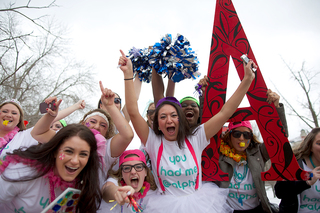 Alpha Gamma Delta sisters celebrate new member recruitment outside of Schine Student Center Sunday afternoon. Recruitment took place during the last two weekends, in which about 900 women met with sisters of the 11 Panhellenic sororites at Syracuse University.