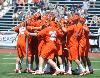 Syracuse celebrates after a goal.