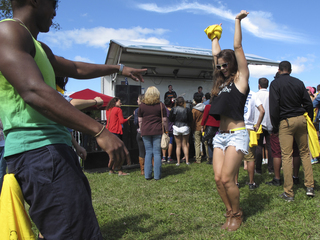 Shelagh Ramsden, a senior in the David B. Falk College of Sport and Human Dynamics, dances during Smallpool's set.