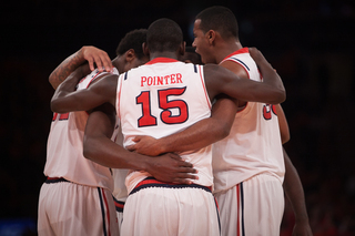 The Red Storm regroups during its mid-game lead against the Orange. 