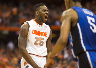 Rakeem Christmas celebrates a thunderous dunk over Parker. 