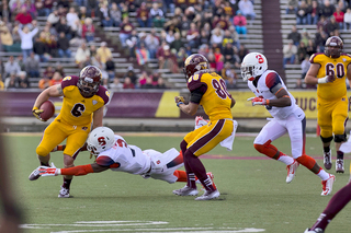 SU's Durell Eskridge (3) attempts to tackle Chippewas' running back Saylor Lavallii near the sideline.