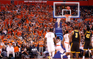 Patterson and Joseph look on as the ball bounces off the rim against Kennesaw State on Friday.