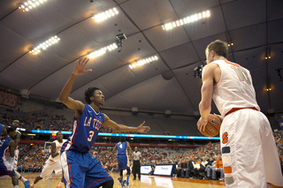 Cooney prepares to inbound the ball while Louisiana Tech's Raheem Appleby defends.