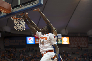 Joseph has a right-handed layup blocked on the left side of the basket.