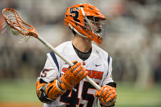 Orange attack Randy Staats scans the field. The senior scored two goals and dished out four assists to tie for the team-high with six points in SU's victory.