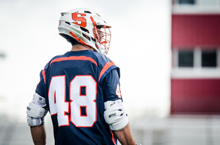 Salcido looks on before the rain poured down at the half. 