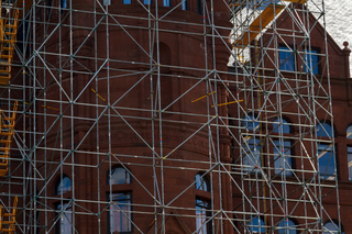 Here is a close-up look at the scaffolding that scales Crouse College as work continues on masonry repairs and installing new windows on the building's skylights. Photo taken Aug. 8, 2017