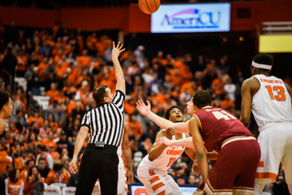 Syracuse and Boston College battle for the jump ball.