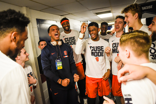 Elijah Hughes leads the team pre-game cheer before the Orange run out onto the court.