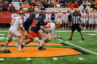 Jakob Phaup (right) fighting for a loose ball. 