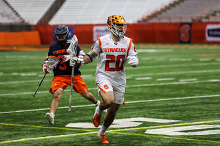 David Lipka carries the ball near midfield. 