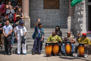 Deputy Mayor Sharon Owens dances along to dumb beats during the flag raising as part of Syracuse's Juneteenth celebrations, June 17th, 2022.